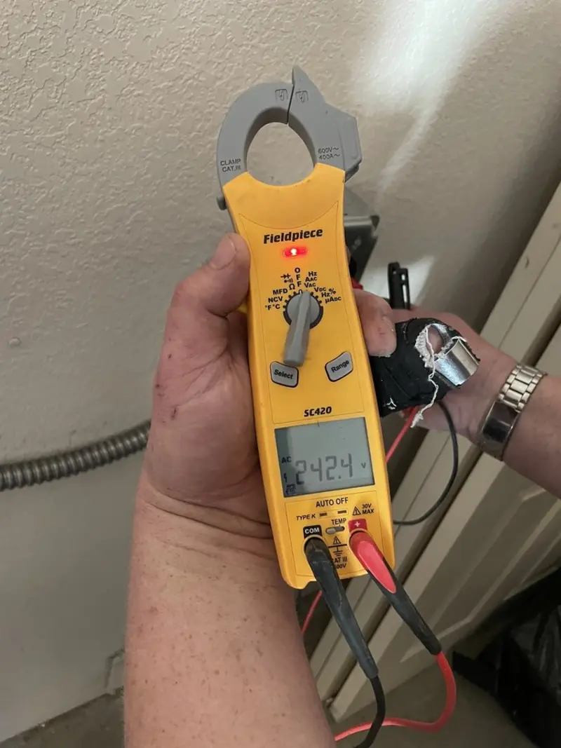 Voltage testing with clamp meter during Hot Tub / Pool Electrical Wiring in Denver